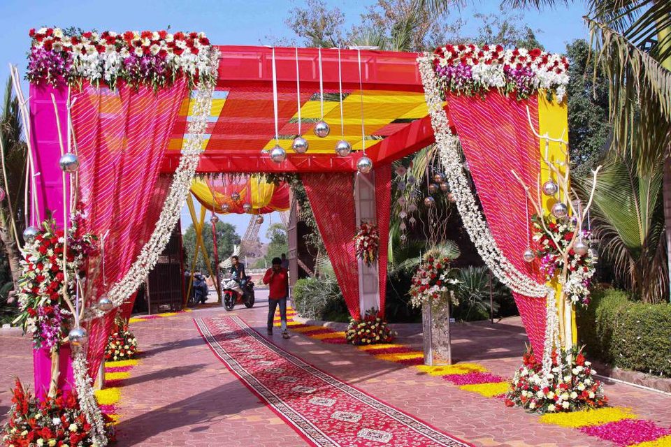 Mandap ceremony area with seating and decor